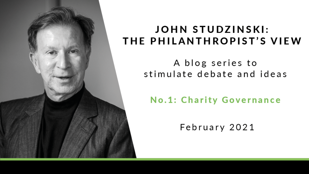 To the left is a black and white photo of John Studzinski, wearing a grey blazer, and a black high neck top underneath. He is smiling and looking at the camera. To the right of the image is a white background with black text saying 'John Studzinski - Philanthropist's View. A blog series to stimulate debate and ideas. No. 1: Charity Governance. February 2021' 